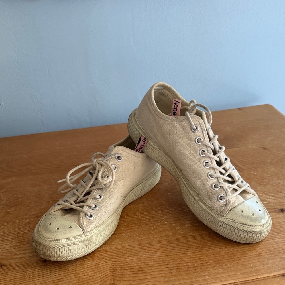 Acne Studios off-white distressed canvas sneakers